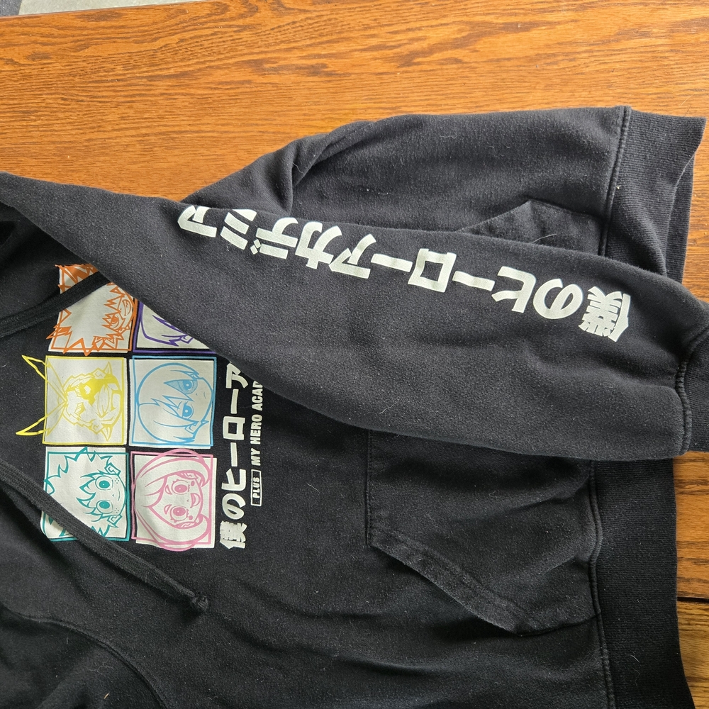 Black Graphic Hoodie with Colorful Anime Design
